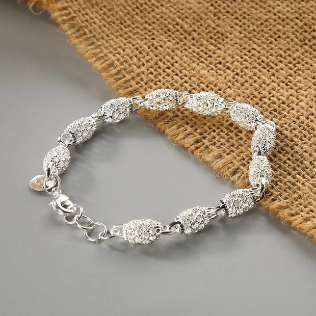 Silver-Plated Hollow Ball Bangle Bracelet Front View