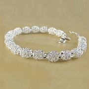 Elegant Silver-Plated Hollow Ball Bracelet Side View