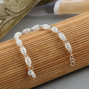Silver-Plated Hollow Ball Bangle Bracelet Front View
